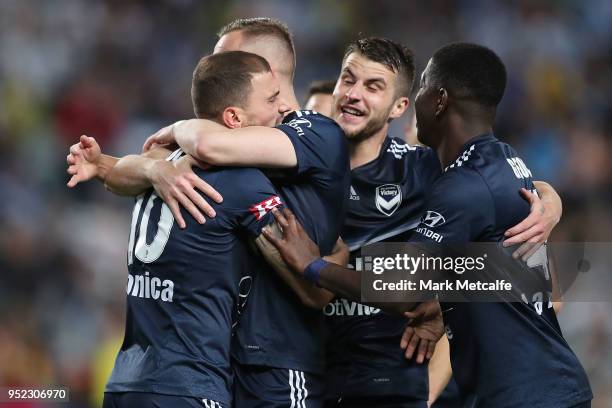 James Troisi of the Victory celebrates scoring a goal with team mates during the A-League Semi Final match between Sydney FC and Melbourne Victory at...