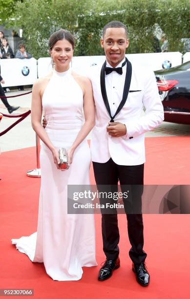 German actress Aylin Tezel and German actor Jerry Hoffmann attend the Lola - German Film Award red carpet at Messe Berlin on April 27, 2018 in...