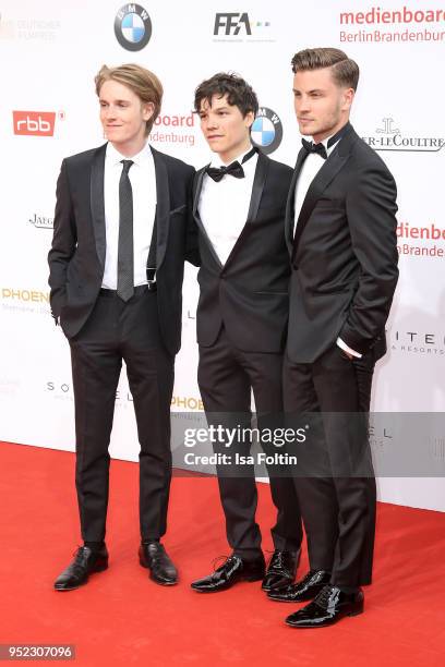 German actors Louis Hofmann, Sebastian Urzendowsky and Jannik Schuemann attend the Lola - German Film Award red carpet at Messe Berlin on April 27,...
