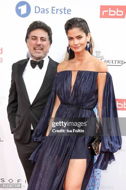 Hair stylist Shan Rahimkhan and German model Shermine Sharivar attends the Lola - German Film Award red carpet at Messe Berlin on April 27, 2018 in...