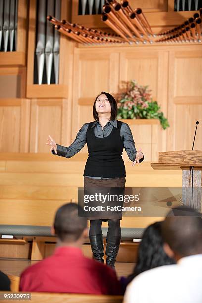 female preacher - priests talking stock pictures, royalty-free photos & images