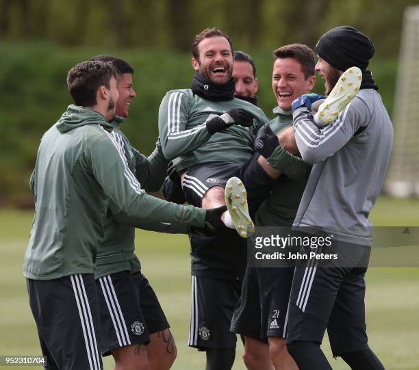 Juan Mata, Matteo Darmian, Marcos Rojo, Ander Herrera and David de Gea of Manchester United in action during a first team training session at Aon...