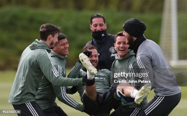 Juan Mata, Matteo Darmian, Marcos Rojo, Ander Herrera and David de Gea of Manchester United in action during a first team training session at Aon...