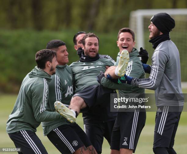 Juan Mata, Matteo Darmian, Marcos Rojo, Ander Herrera and David de Gea of Manchester United in action during a first team training session at Aon...