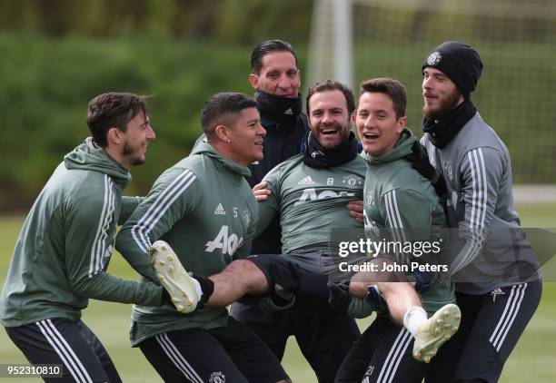 Juan Mata, Matteo Darmian, Marcos Rojo, Ander Herrera and David de Gea of Manchester United in action during a first team training session at Aon...