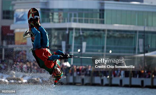 Flying Elf" leaps into the air on a sky ski while cruising on the Potomac River December 24, 2009 in National Harbor, Maryland. This is the 22nd...