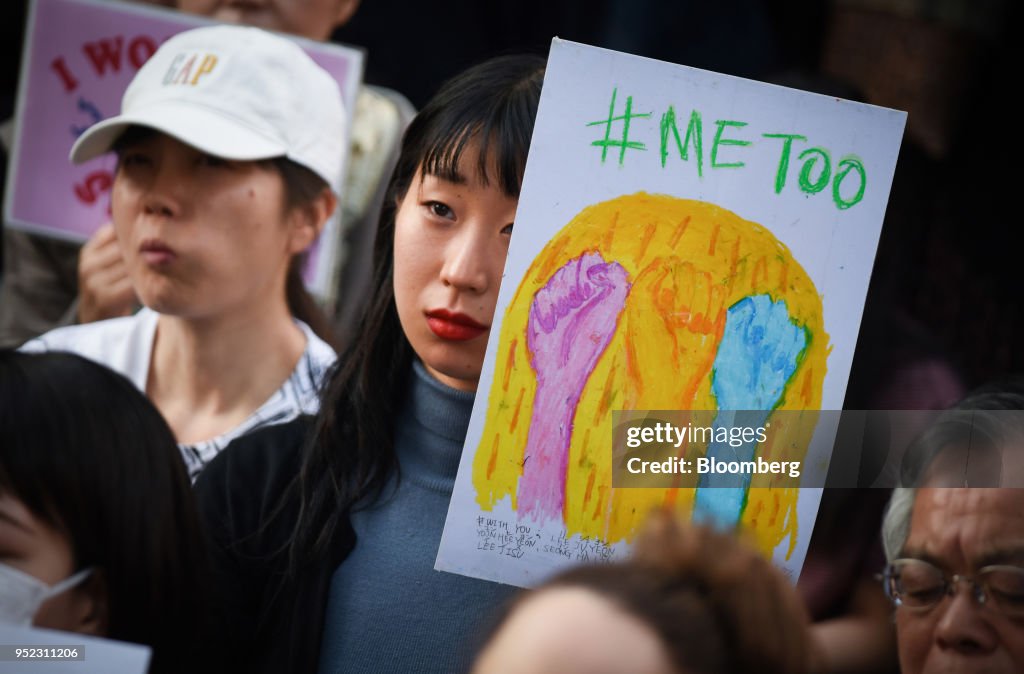Metoo Rally A demonstrator holds a sign reading