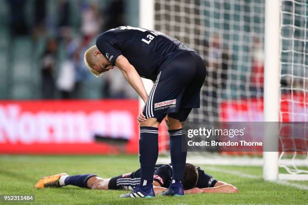 Terry Antonis of the Victory lays on the ground after scoring an own goal during the A-League Semi Final match between Sydney FC and Melbourne...