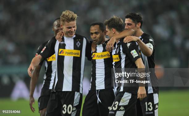 Nico Elvedi of Moenchengladbach, Raffael of Moenchengladbach, Jonas Hofmann of Moenchengladbach, Lars Stindl of Moenchengladbach celebrate during the...