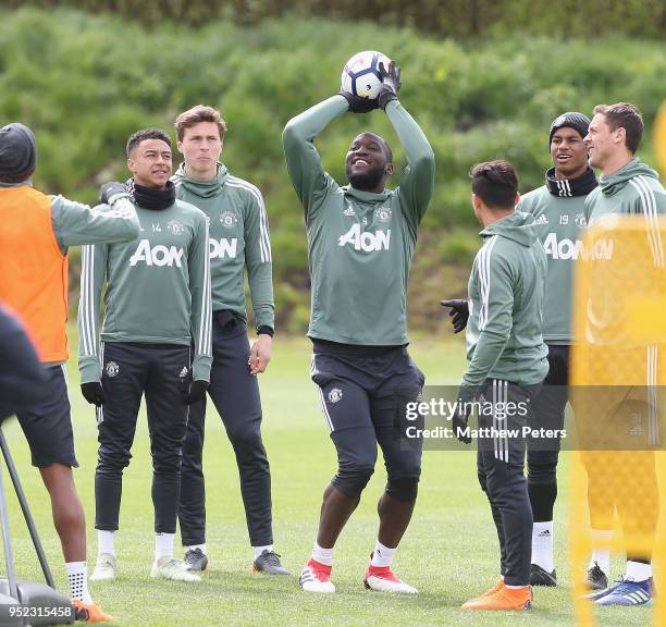 Jesse Lingard, Victor Lindelof, Romelu Lukaku and Marcus Rashford of Manchester United in action during a first team training session at Aon Training...