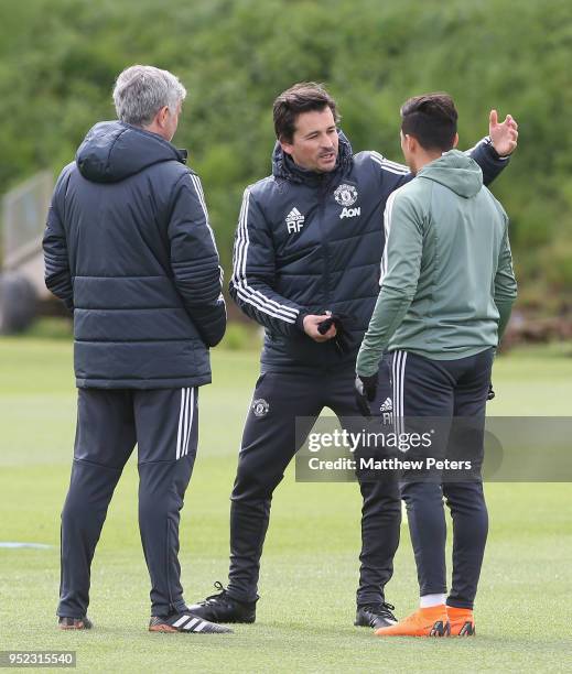 Alexis Sanchez, Assistant Manager Rui Faria and Manager Jose Mourinho of Manchester United in action during a first team training session at Aon...