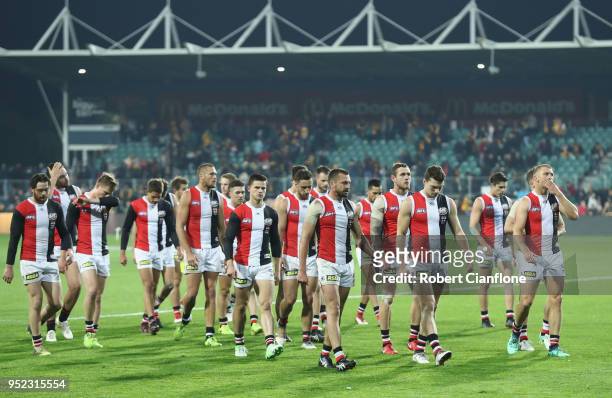 The Saints walk off the ground after they were defeated by the Hawks during the Round six AFL match between the Hawthorn Hawks and the St Kilda...