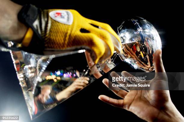 Players from the Pittsburgh Steelers celebrate with the Vince Lombardi trophy after their 27-23 win against the Arizona Cardinals during Super Bowl...