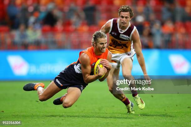 Harrison Himmelberg of the Giants takes a mark during the round six AFL match between the Greater Western Sydney Giants and the Brisbane Lions at...