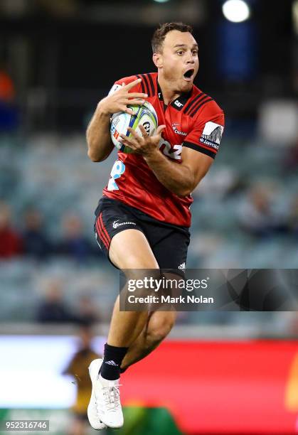 Israel Dagg of the Crusaders takes a high ball during the round 11 Super Rugby match between the Brumbies and the Crusaders at GIO Stadium on April...