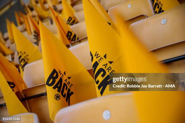 Flags which read We Are Back are seen prior to the Sky Bet Championship match between Wolverhampton Wanderers and Sheffield Wednesday at Molineux on...