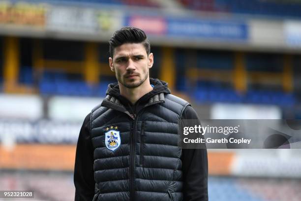 Christopher Schindler of Huddersfield Town inspects the pitch prior to the Premier League match between Huddersfield Town and Everton at John Smith's...