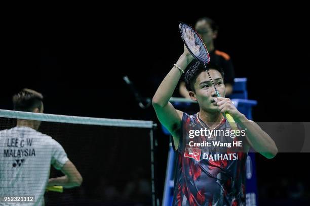Kento Momota of Japan Celebrate wins the game after singles semi final match against Lee Chong Wei of Malaysia at the 2018 Badminton Asia...