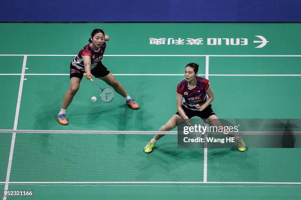 Kim So Yeong and Her Long Kong of Korea hits a return during their women's doubles Semi final match against Ayaka Takahashi and Misaki Matsutomo of...