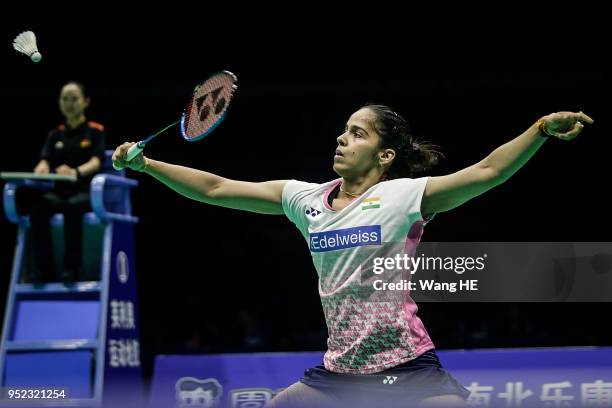 Saina Nehwal of India hits a return during singles Semi final match against Tai Tzu Ying of Chinese Taipei at the 2018 Badminton Asia Championships...