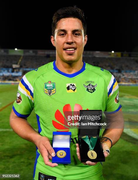 Joseph Tapine of the Raiders poses with the Man of the Match medal at the end of the round eight NRL match between the North Queensland Cowboys and...