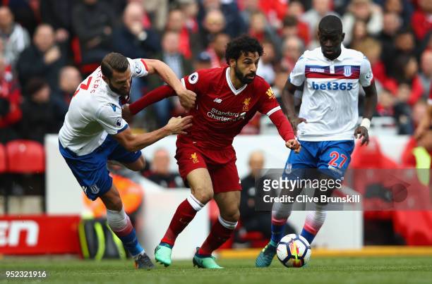 Mohamed Salah of Liverpool goes past Erik Pieters of Stoke City during the Premier League match between Liverpool and Stoke City at Anfield on April...