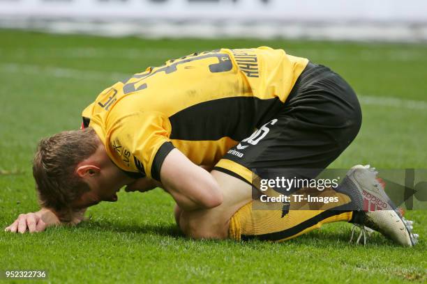 Niklas Hauptmann of Dresden on the ground during the Second Bundesliga match between SG Dynamo Dresden and Holstein Kiel at DDV-Stadion on April 14,...