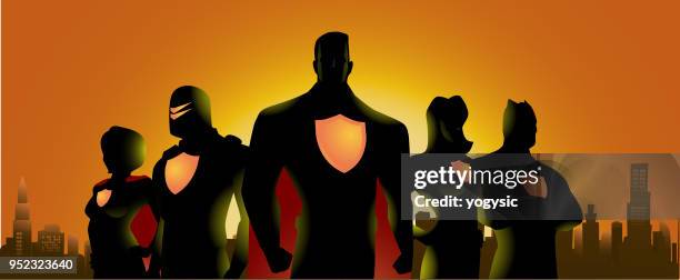 superhero team silhouette in city skyline background - superman logo stock illustrations