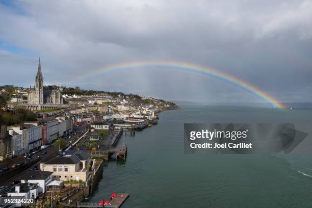 rainbow at st. colman's cathedral in cobh, ireland - ireland rainbow stock pictures, royalty-free photos & images