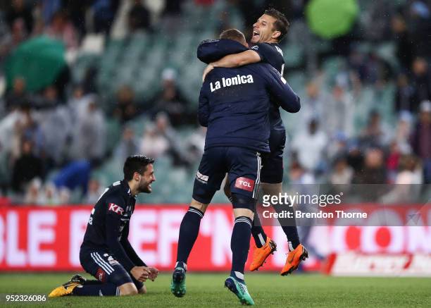 Besart Berisha and Kosta Barbarouses of the Victory celebrate at full time during the A-League Semi Final match between Sydney FC and Melbourne...