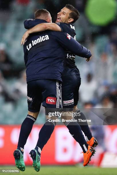 Besart Berisha and Kosta Barbarouses of the Victory celebrate at full time during the A-League Semi Final match between Sydney FC and Melbourne...