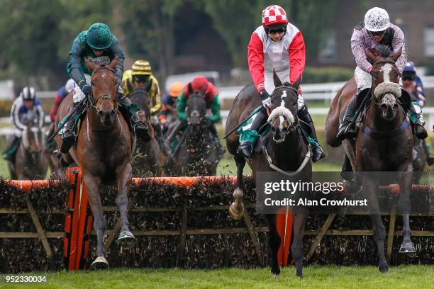 Daryl Jacob riding Ballymoy clear the last to win The bet365 Novices' Championship Final Handicap Hurdle at Sandown Park racecourse on April 28, 2018...