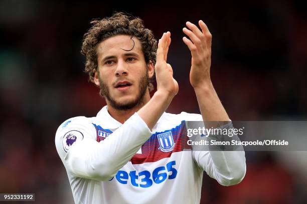 Ramadan Sobhi of Stoke applauds the support at the end of the Premier League match between Liverpool and Stoke City at Anfield on April 28, 2018 in...