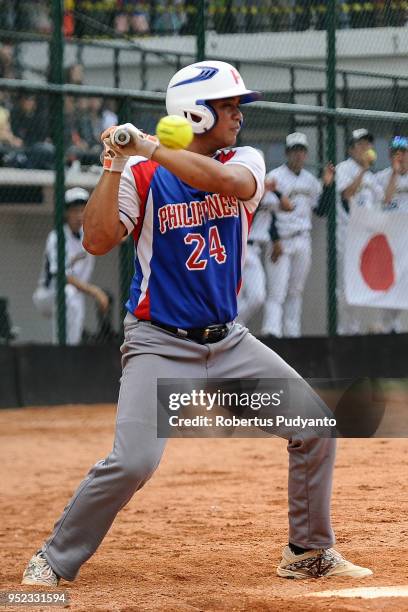 Julis Caesar Visaya of Philippines bats during the final match between Japan and Philippines in the 10th Asian Men's Softball Championship on April...