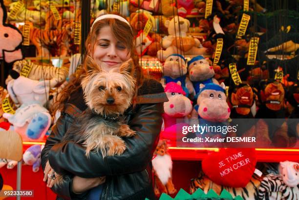 Steffie Courtaud and her dog Buddah, at her parent's raffle at the Foire du Trône. It's the first time they take part in it. Steffie Courtaud et son...