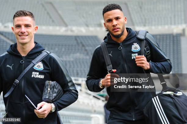 Ciaran Clark of Newcastle United and Jamaal Lascelles arrives for the Premier League match between Newcastle United and West Bromwich Albion at...
