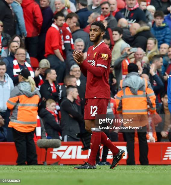 Joe Gomez of Liverpool shows his appreciation to the fans at the end of the Premier League match between Liverpool and Stoke City at Anfield on April...