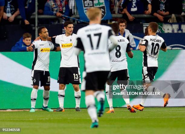 Moenchengladbach's Brazilian foward Raffael , German foward Lars Stindl , Swiss midfielder Denis Zakaria and Belgian foward Thorgan Hazard celebrate...