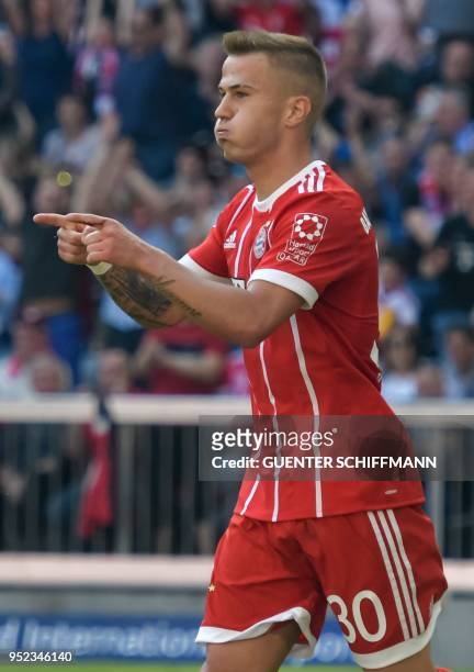 Bayern Munich's German midfielder Niklas Dorsch celebrates after scoring the 1-0 during the German first division Bundesliga football match FC Bayern...