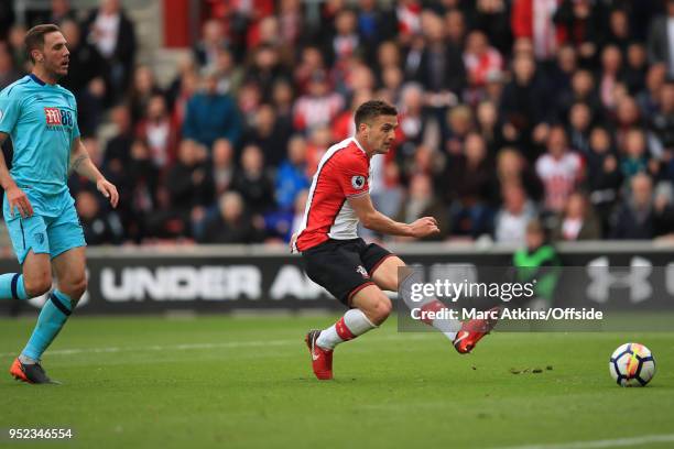 Dusan Tadic of Southampton scores the opening goal during the Premier League match between Southampton and AFC Bournemouth at St Mary's Stadium on...