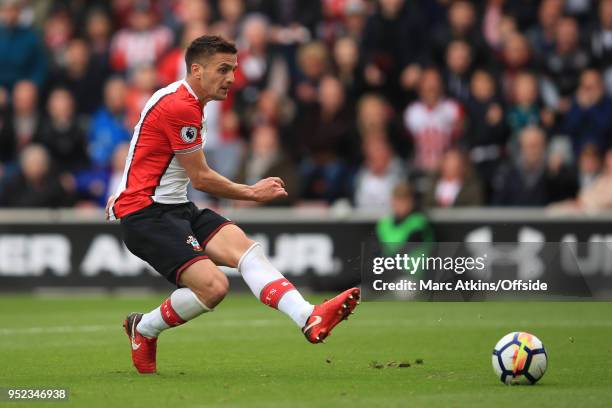 Dusan Tadic of Southampton scores the opening goal during the Premier League match between Southampton and AFC Bournemouth at St Mary's Stadium on...