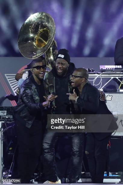Usher, Robert Glasper, and Kirk Franklin perform during The Concert for Peace and Justice celebrating the opening of The Legacy Museum at Riverwalk...