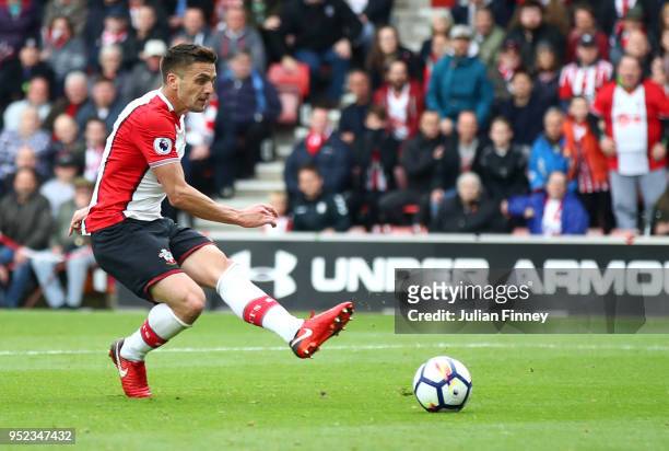 Dusan Tadic of Southampton shoots and scores his side's first goal during the Premier League match between Southampton and AFC Bournemouth at St...