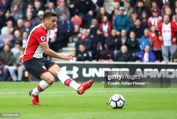 Dusan Tadic of Southampton shoots and scores his side's first goal during the Premier League match between Southampton and AFC Bournemouth at St...