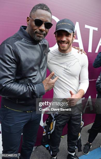 Idris Elba and Jean-Eric Vergne attend the ABB FIA Formula E Qatar Airways Paris E-Prix 2018 on April 28, 2018 in Paris, France.