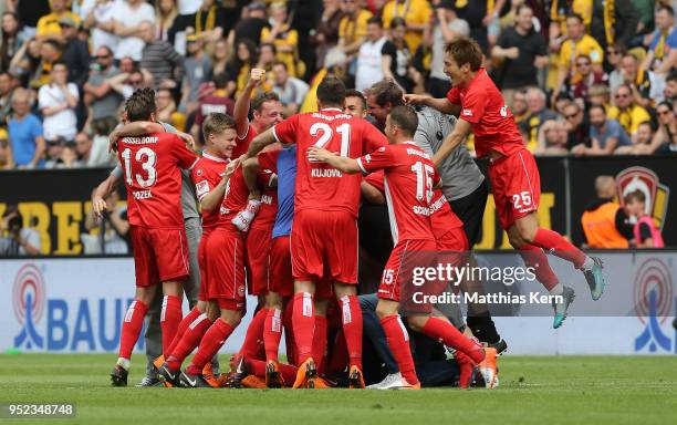 The players of Duesseldorf jubilate after moving up into the Bundesliga after the Second Bundesliga match between SG Dynamo Dresden and Fortuna...