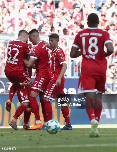 Niklas Dorsch of FC Bayern Munchen celebrates his first goal with teammates Joshua Kimmich , Sandro Wagner, Meritan Shabani and Franck Evina during...