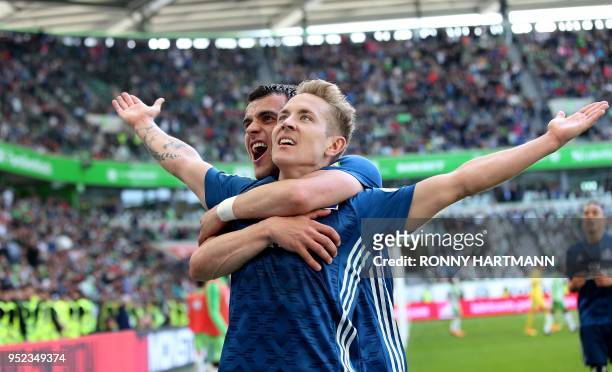 Hamburg«s German midfielder Lewis Holtby celebrates with his teammate Hamburg's Serbian midfielder Filip Kostic after scoring his team's second goal...