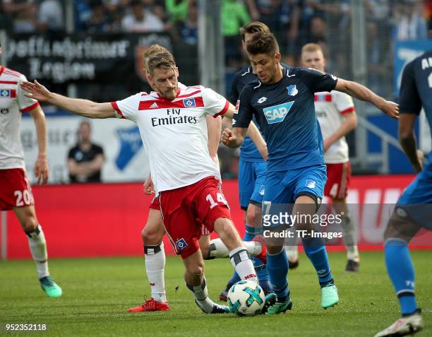 Aaron Hunt of Hamburg and Andrej Kramaric of Hoffenheim battle for the ball during the Bundesliga match between TSG 1899 Hoffenheim and Hamburger SV...