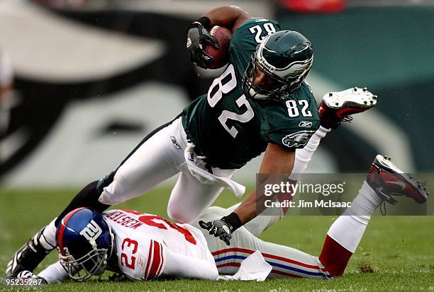 Alex Smith of the Philadelphia Eagles is tackled on a run by Corey Webster of the New York Giants on November 1, 2009 at Lincoln Financial Field in...